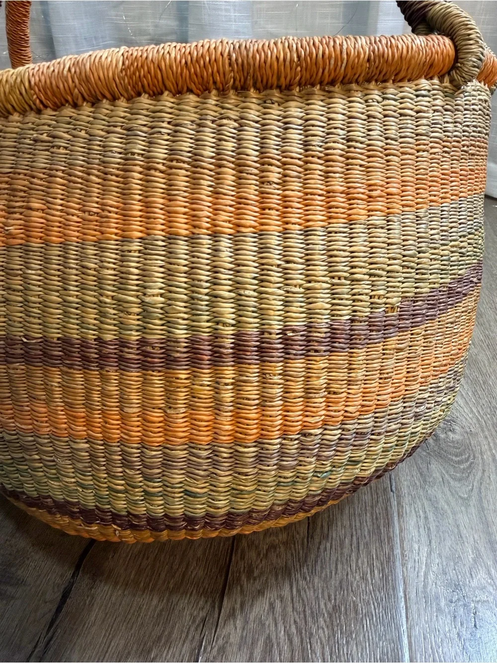 Large handmade vintage shopping basket with a leather handle.